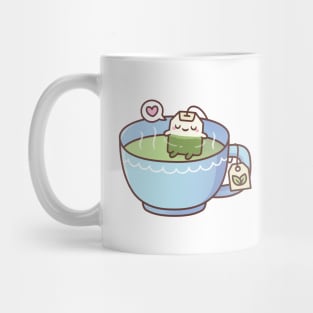 Cute Tea Bag Relaxing In A Tea Cup Mug